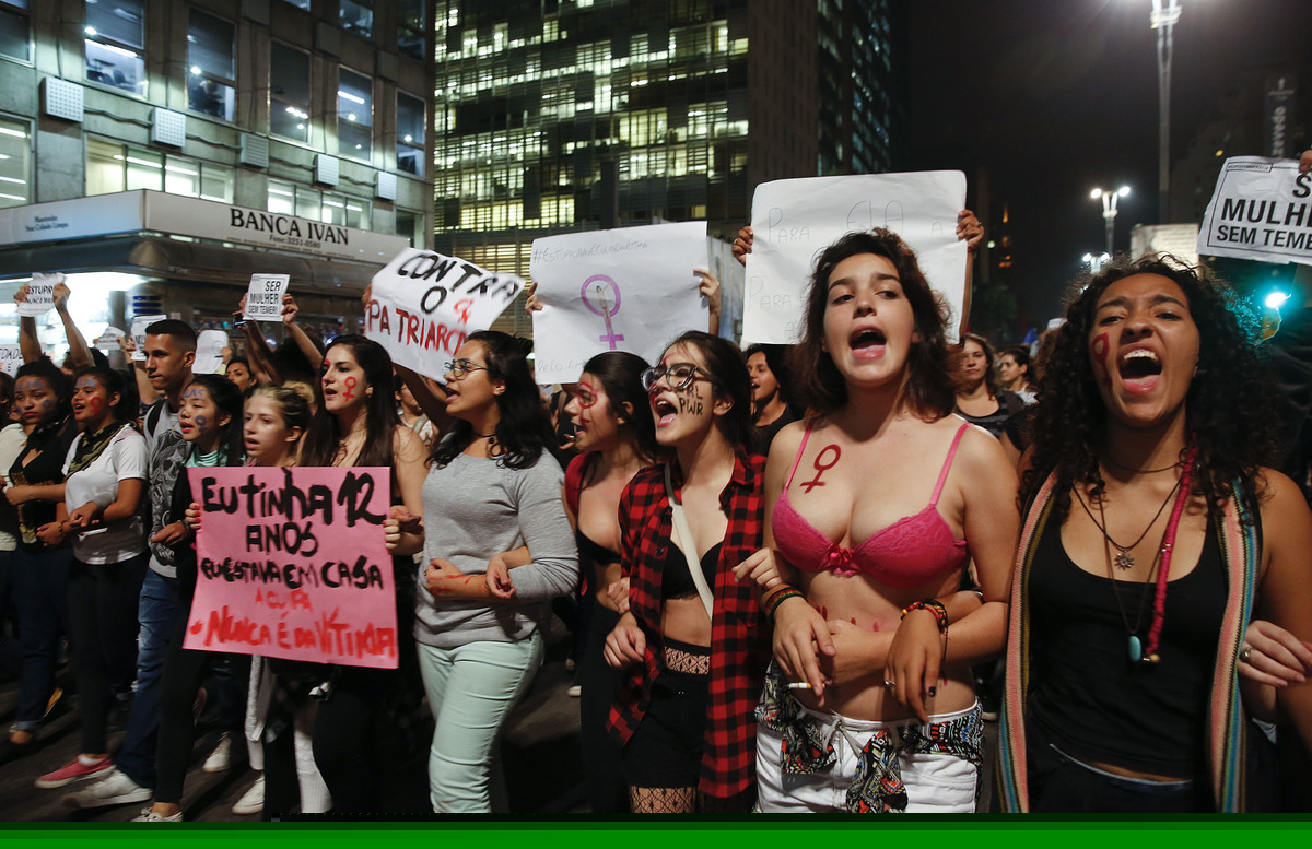 Women march during a protest against the gang rape of a 16-year-old girl in Sao Paulo, Brazil, Wednesday, June 1, 2016. In response to the assault, Brazil's interim President Michel Temer said that Brazil will set up a specialized group to fight violence against women. (AP Photo/Andre Penner)